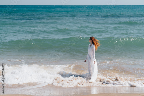 beautiful woman in a white dress by the ocean Lifestyle