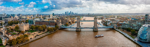 Canvas Print Aerial panoramic cityscape view of the London Tower Bridge and the River Thames, England, United Kingdom
