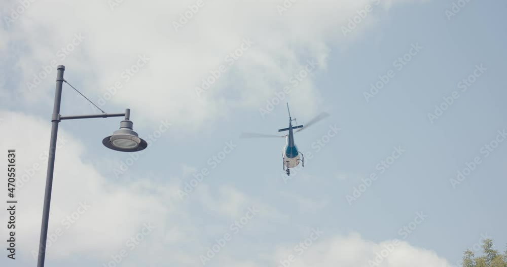 Helicopter or chopper flying on the sky live sports event camera Helicopter or chopper flying on the sky live sports event camera