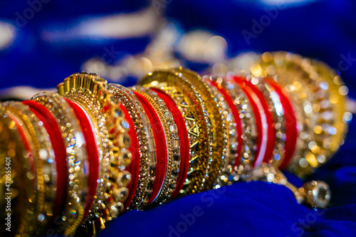 Indian bride's red wedding bangles close up photo