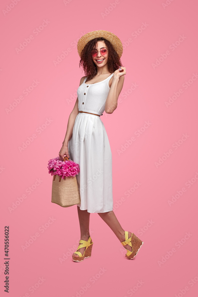 Stylish woman with bouquet of flowers Stylish woman with bouquet of flowers