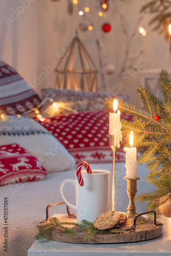 christmas home decorations with candles in red and white colors