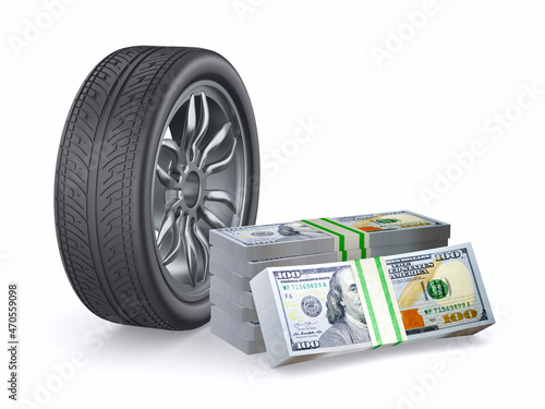 tire and money on white bac...