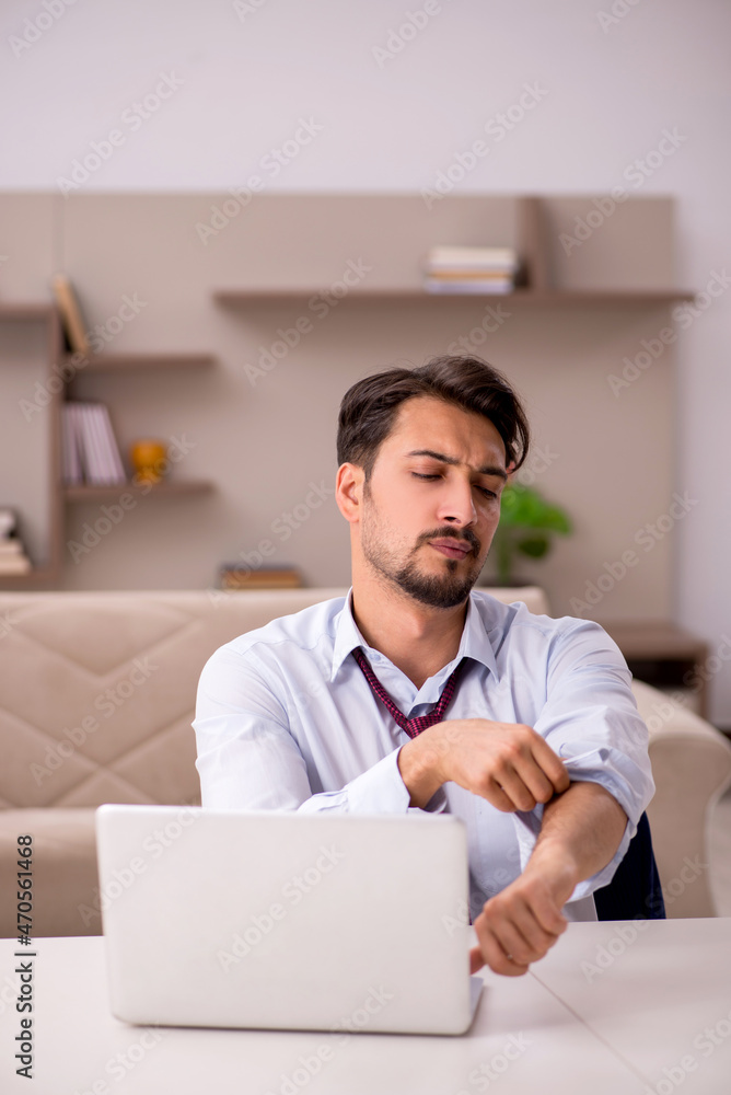 Young businessman working from house Young businessman working from house
