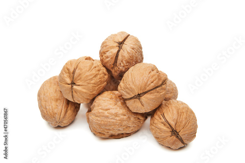 Walnuts heap isolated on a white background
