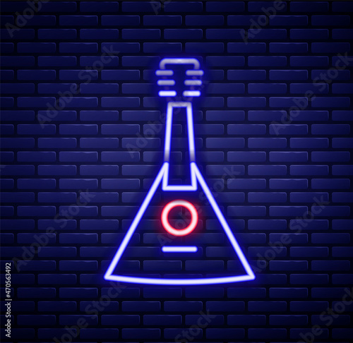 Glowing neon line Musical instrument balalaika icon isolated on brick wall background. Colorful outline concept. Vector