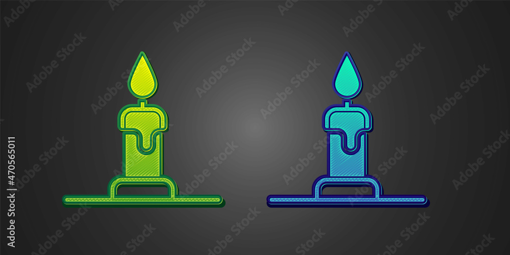Green and blue Burning candle in candlestick icon isolated on black background. Cylindrical candle stick with burning flame. Vector Green and blue Burning candle in candlestick icon isolated on black background. Cylindrical candle stick with burning flame. Vector