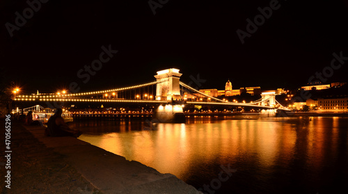 Beautiful panoramic view of the night Budapest and the Chain bridge over the Danube. View of the Royal Palace from Pest photo
