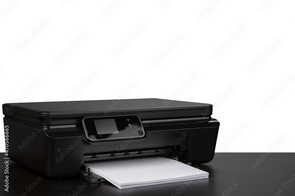 Laser home printer on table against white backgorund Laser home printer on table against white backgorund