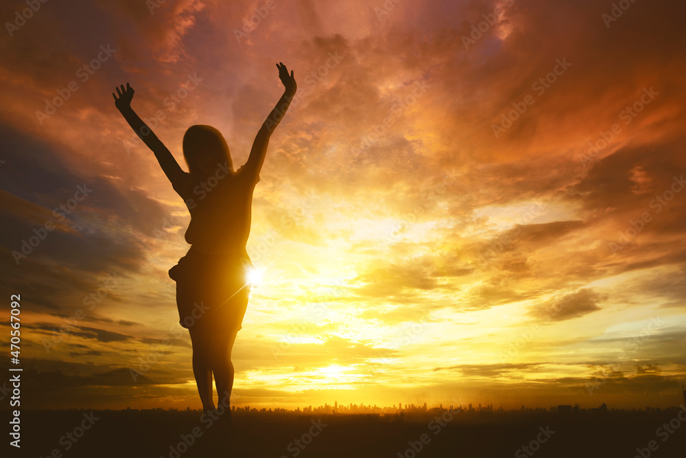 Success businesswoman stands with dramatic sky Success businesswoman stands with dramatic sky