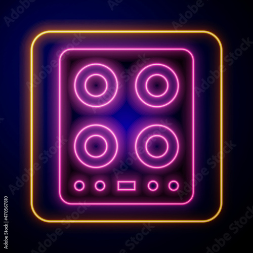 Glowing neon Gas stove icon isolated on black background. Cooktop sign. Hob with four circle burners. Vector