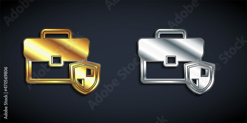 Gold and silver Briefcase with shield icon isolated on black background. Insurance concept. Security, safety, protection, protect concept. Long shadow style. Vector