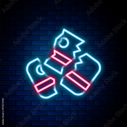 Glowing neon line Scissors cutting a credit card icon isolated on brick wall background. Online payment. Cash withdrawal. Financial operations. Shopping sign. Colorful outline concept. Vector