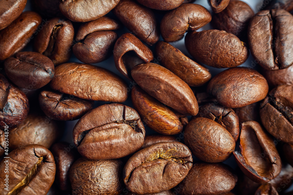 Naklejka premium Coffee roasted beans texture background. Beverage, food, morning refreshment