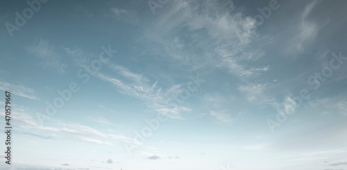 Panorama of blue sky with cirrus clouds photo