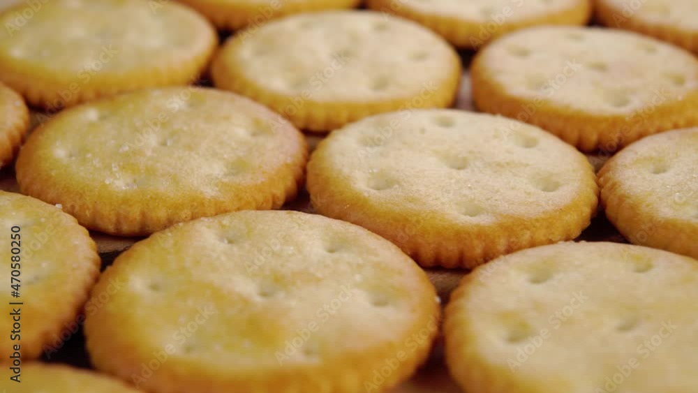 Dry tasty crispy crackers. Thin round cookies. Macro. Slow rotation Dry tasty crispy crackers. Thin round cookies. Macro. Slow rotation