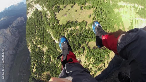 Facing heights fear conquering it paragliding at Swiss alps photo