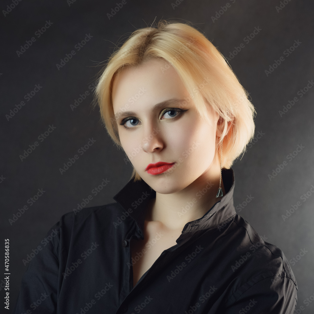 Portrait of a beautiful young woman with blue eyes. Portrait of a beautiful young woman with blue eyes.