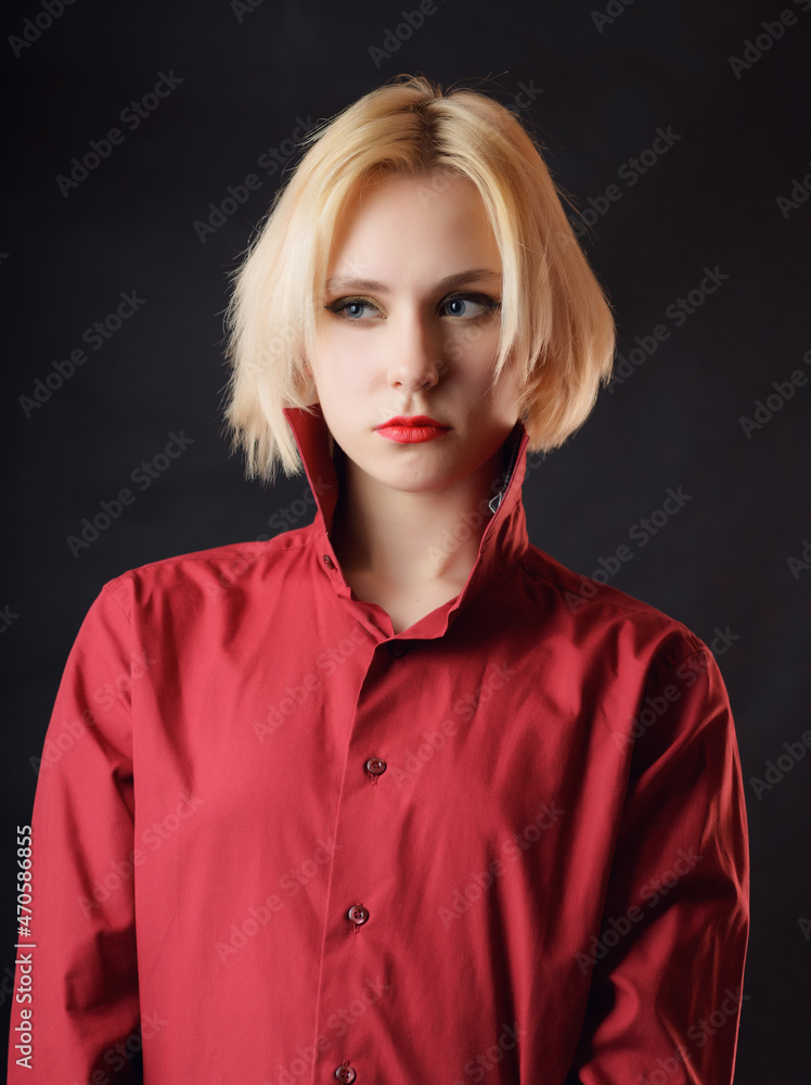 Portrait of a beautiful young woman with blue eyes. Portrait of a beautiful young woman with blue eyes.