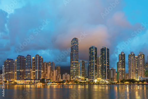 Panorama of skyline and Harbor of midtown of Hong Kong city at dusk