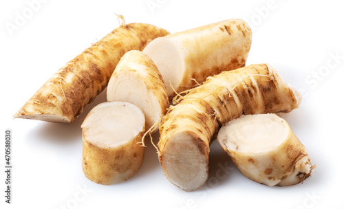 Horseradish roots close up isolated on white background.