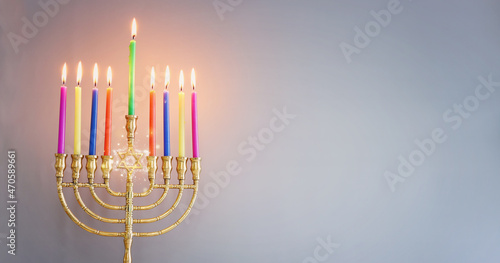 Image of jewish holiday Hanukkah with menorah (traditional candelabra) and candles