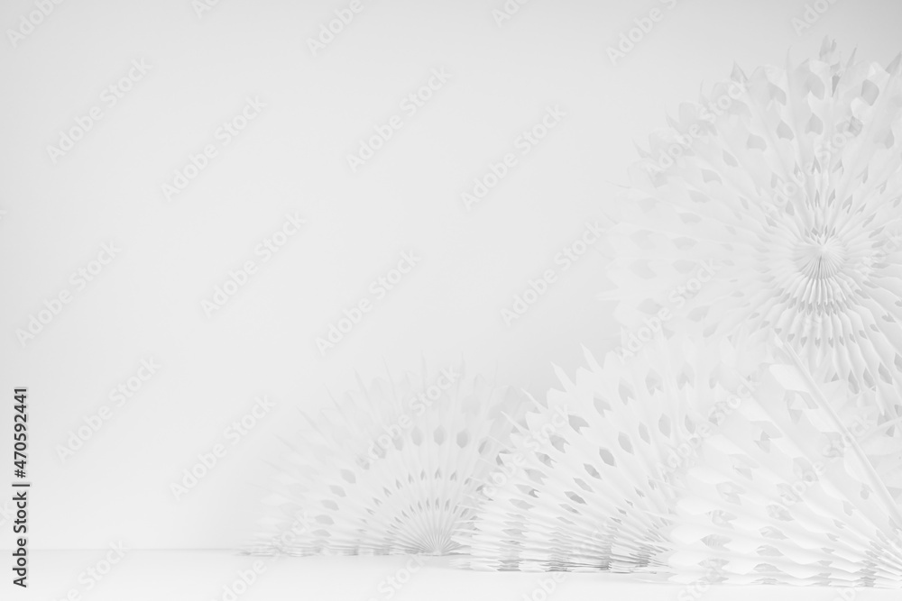 Delicate soft light white abstract scene for showing produce or goods with round carved paper fans in asian style flying and standing on table, copy space. Delicate soft light white abstract scene for showing produce or goods with round carved paper fans in asian style flying and standing on table, copy space.