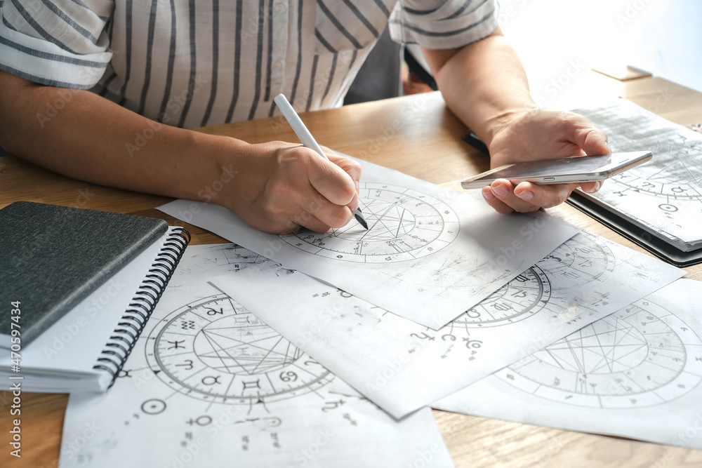 Astrology. Astrologer calculates a natal chart and makes a forecast of fate. Astrological forecast, mysticism, science. Astrological background. Astrology. Astrologer calculates a natal chart and makes a forecast of fate. Astrological forecast, mysticism, science. Astrological background.