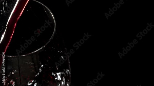 Red Wine Being Poured Into Glass