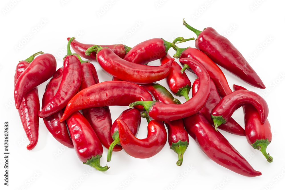 Heap of red peppers chili on a white background