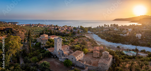 Fototapeta Naklejka Na Ścianę i Meble -  Panoramic aerial view of the old town of Kardamyli during a warm summer sunset, Lakonia, Mani, Greece