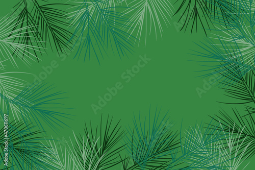Świąteczne gałązki na zielonym tle.