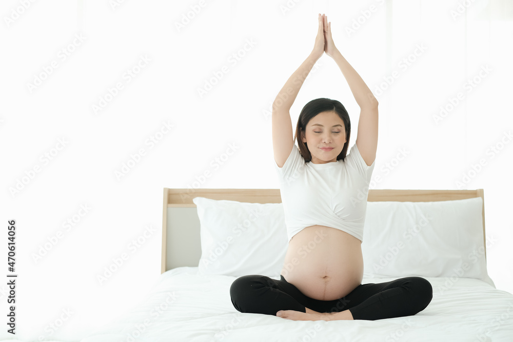 pregnant playing yoga poses on the bed pregnant playing yoga poses on the bed