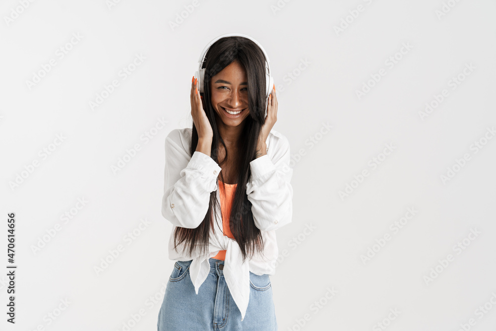 © Drobot Dean - Smiling young african woman with long dark hair