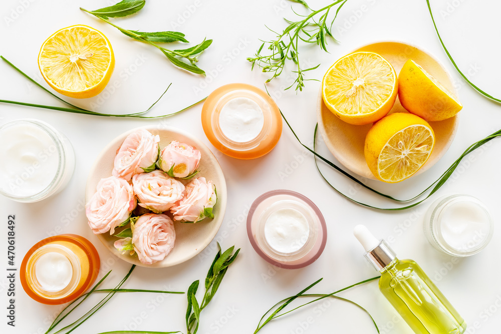 Citrus essential oil and medicine herbal cosmetic with flowers Citrus essential oil and medicine herbal cosmetic with flowers