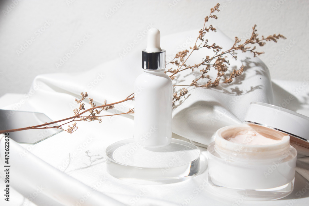 Fototapeta white wood table background with lifestyle, cosmetic makeup bottle lotion cream product with beauty fashion skincare healthcare mockup