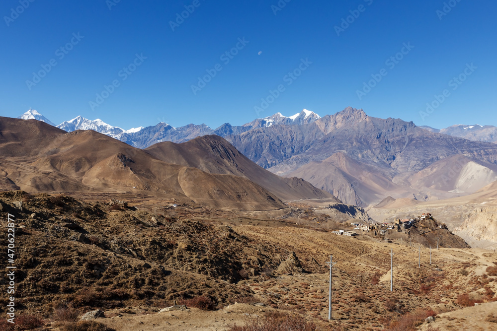 View of the village of Jharkot. Mustang District, Nepal. Dhaulagiri and Tukuche Peak in the background