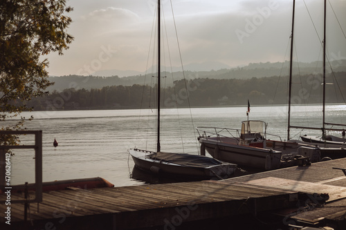 boats at sunset river