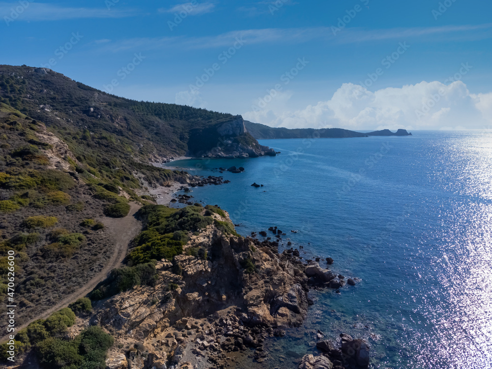 The waves of the sun-shine sea crash on the shore. Aerial shot with drone The waves of the sun-shine sea crash on the shore. Aerial shot with drone