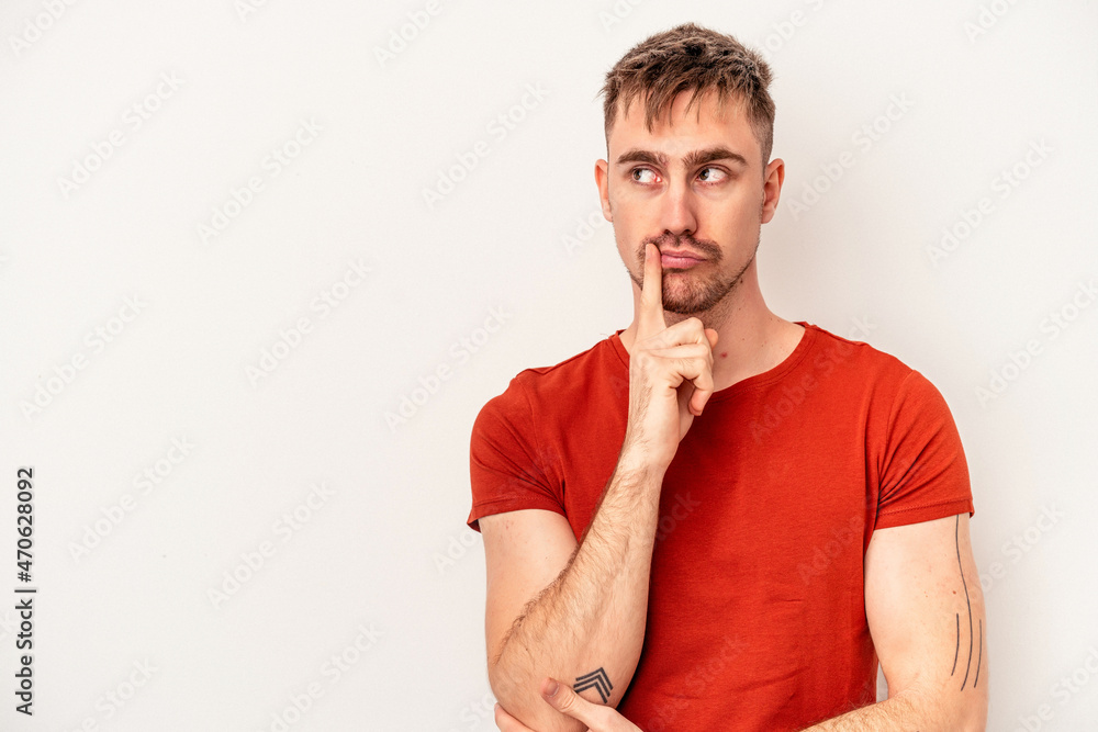 Young caucasian man isolated on white background showing thumb down, disappointment concept. Young caucasian man isolated on white background showing thumb down, disappointment concept.