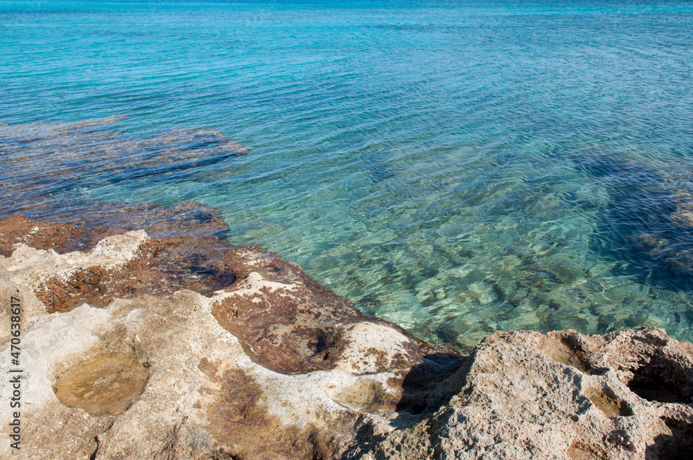 Obraz premium Rocks and Blue Water. Salento, South Italy