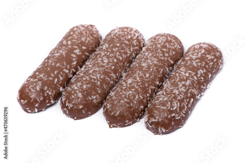 Group of long chocolate bars with coconut powder