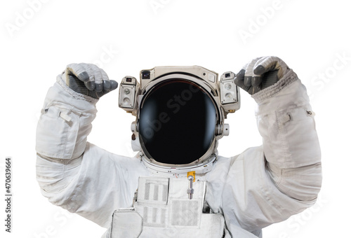 Astronaut in space suit rises hands up