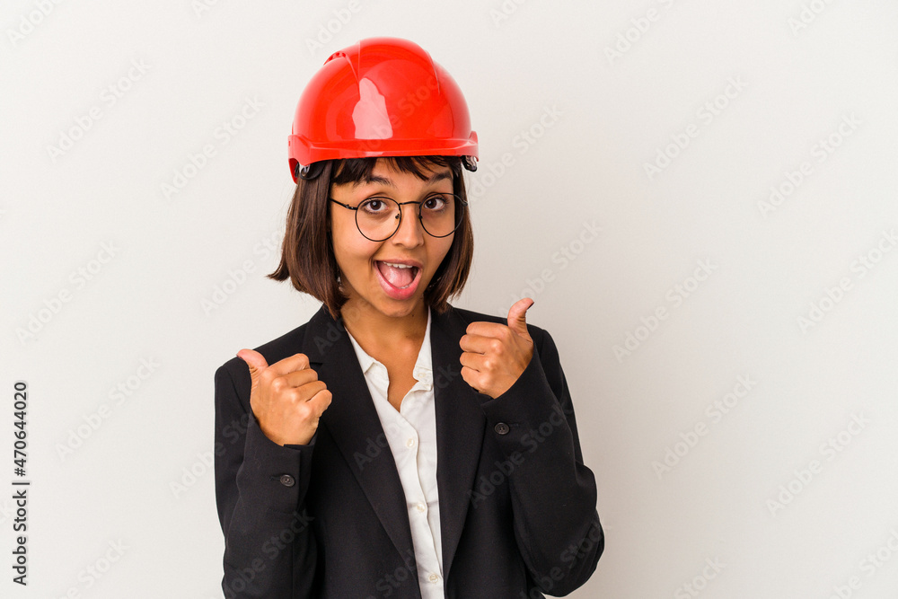 Young architect woman with red helmet isolated on white background raising both thumbs up, smiling and confident. Young architect woman with red helmet isolated on white background raising both thumbs up, smiling and confident.