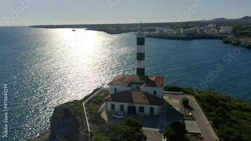 Aerial view, flight at the bay of Portocolom and Cala Parbacana, lighthouse, Punta de ses Crestes, Potocolom, Mallorca, Balearic Islands, Spain, photo