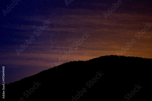 Beautiful view of starry sky over mountains at night © New Africa