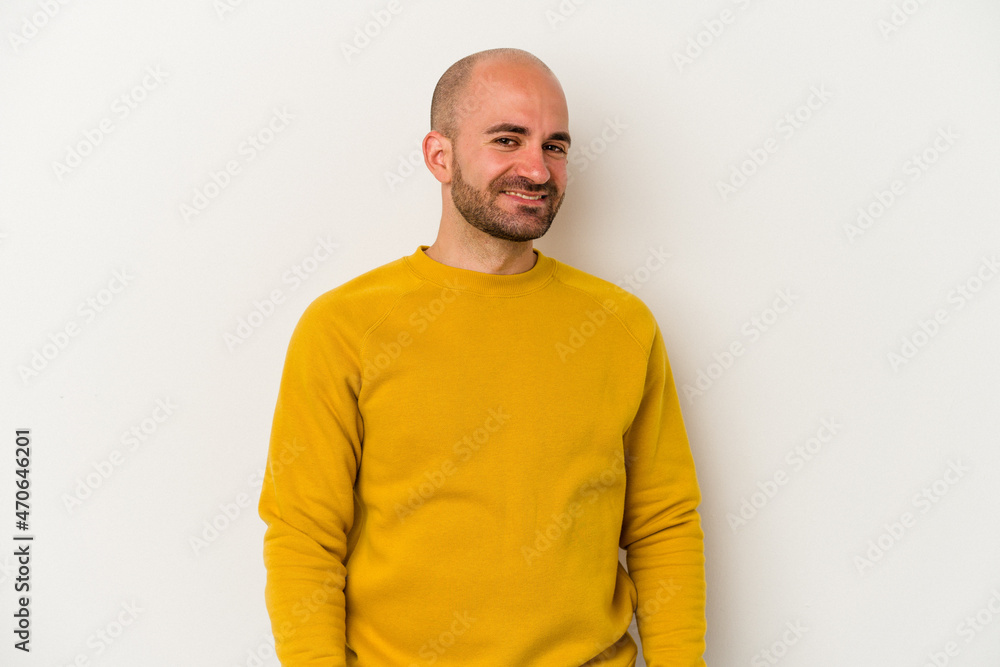 Young bald man isolated on white background confident keeping hands on hips. Young bald man isolated on white background confident keeping hands on hips.