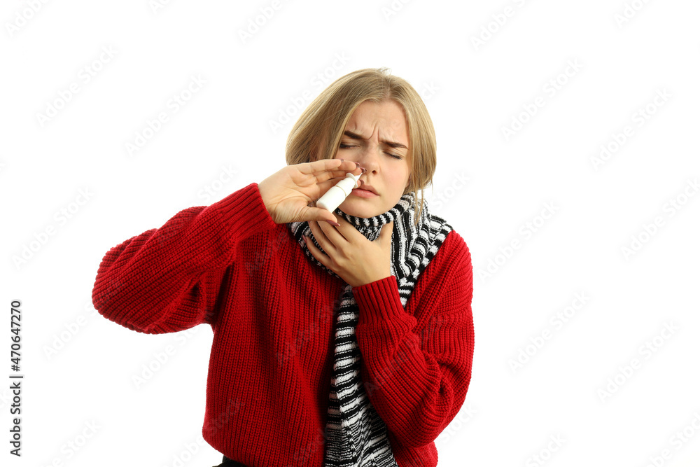 Young woman with nasal spray isolated on white background