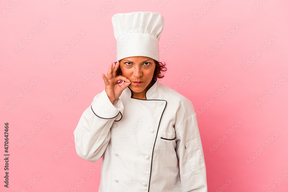 Middle age latin woman isolated on pink background with fingers on lips keeping a secret. Middle age latin woman isolated on pink background with fingers on lips keeping a secret.