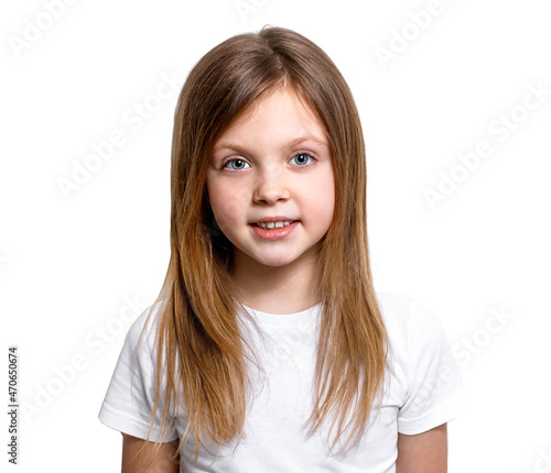 Isolated portrait of a little girl with a smile on the white background close-up